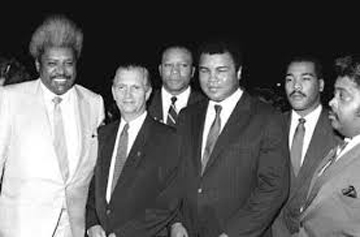Dexter King, Muhammad Ali, Bonecrusher Smith, Jamaica Prime Minister Seaga, and Don King in Jamaica in the late 1980’s.