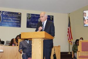 Assemblyman Jonathan Jacobson addresses the crowd at the Dr. Martin Luther King Jr. Commemorative Service at Beulah Baptist Church.