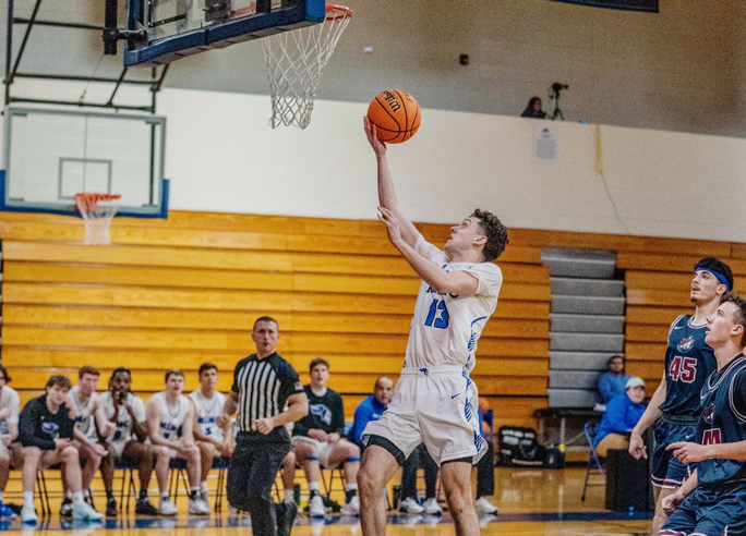 Ryan Graham’s game-high 26 points led the Mount Saint Mary College Knights to a hard-fought 80-72 victory over the University of Mount Saint Vincent Dolphins.