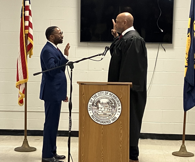 Robert McLymore gets sworn in as City of Newburgh Council Member by The Honorable Eddie Loren Williams NYS Supreme Court, 9th JD as his family watches.