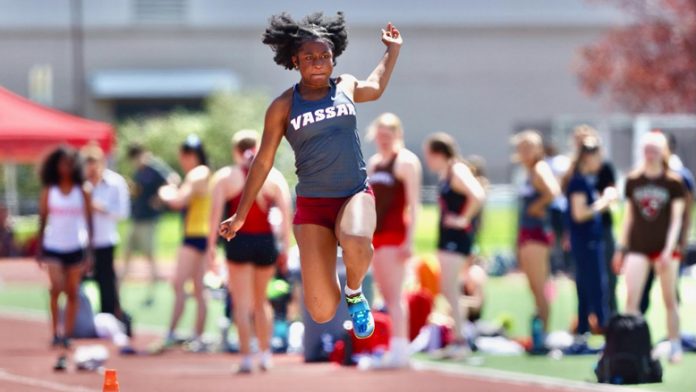 Vassar Sophomore Jahmilia Dennis set the new school record mark in the triple jump on Friday night and now ranks in the top 25 nationally in the triple jump at 11.83 meters. Photo: Carlisle Stockton