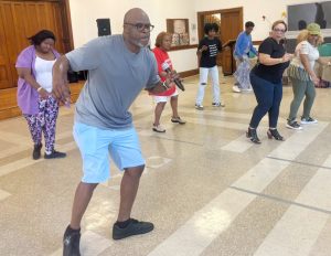 Steve "Fun Bunch" Dillard teaches Gospel Line Dancing at Baptist Temple.