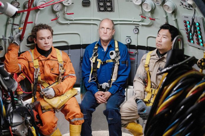 Finn Cole stars as Chris Lemons, Woody Harrelson as Duncan Allcock and Simu Liu as Dave Yuasa LAST BREATH, a Focus Features release. Photo: Mark Cassar
