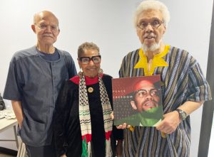 Guest Speakers Dr. Abdul Alkalimat and Dr. Rosemari Mealy pose with Event Facilitator and Sponsor Dr. William W. Sales, Jr. at Malcolm X's 100th Birthday Celebration.