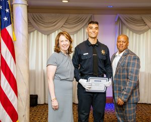Dominick Almeida, center, received the Top Academic Award and the Krupica Scholarship Award.