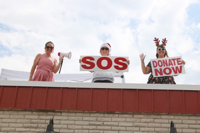 Principals Kate Berardi (Chambers), Melissa Jamieson (JFK), and Kathleen Sickles (Crosby) took their turn on the roof to support the cause..