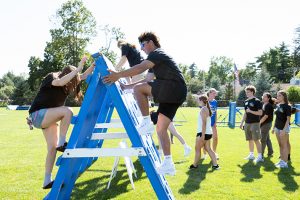 First-year students enjoyed a challenging obstacle course with their new classmates on Saturday, August 23, on the Mount Saint Mary College campus. Photo by Lee Ferris.