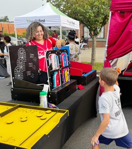 Kids play handmade carnival games and win prizes at EZ Play Entertainment at Newburgh's 36th National Night Out.
