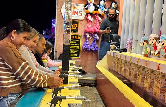 Fairgoers played carnival games at the 36th Annual International Festival.