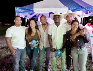 Jairo Palacios (third from right) poses with his family and friends at the 36th Annual International Festival.