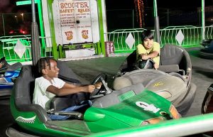 Fairgoers ride carnival rides at the 36th Annual International Festival.
