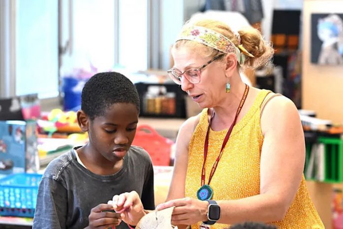 Nearly two-dozen fifth-graders at Hamilton School spent a class Friday stitching Mexican embroidery as part of Hispanic History Month - and they were hooked – literally.