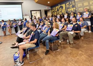 The Newburgh Teacher’s Association made its presence known with blue-and-white signs calling for a new contract during the special school board meeting.