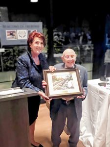 Denise Doring VanBuren, President, Beacon Historical Society presents George Atkinson with an award during the Ninth Annual “Beacons of History” event.