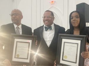 On left, Kevin White and on Left, Jemika Hall, both were recognized by City of Newburgh Mayor, Torrance Harvey ( middle) for their transformative contributions to the community at Saturday’s Gala.