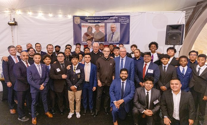 Rev. Connell and Rev. Leahy with the evening’s IMPACT Honorees, special guests, and San Miguel Academy graduates who are breaking the cycle of poverty through education.