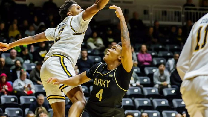Jaxson Bell scored 12 points off the bench, went 7-of-8 at the free-throw line and led the team with 10 rebounds for his first career double-double in 30 minutes. Photo: Lynn Fern