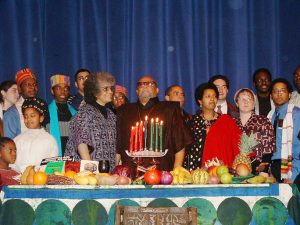 Maulana Karenga (center) during a past Kwanzaa celebration. Credit: Wikimedia.