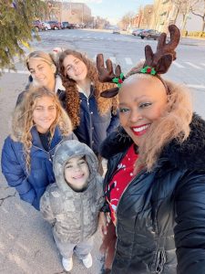 Wednesday afternoon, Christmas Eve, Grant Foresight, Inc. held its first Annual Adopt a Family Christmas Present Event in front of the City of Newburgh’s Christmas Tree, located near City Hall on 83 Broadway.Here, Sonya Grant, her husband, and three children, continued their 14 years of holiday giving journey, presenting individual bags of presents to members of the Colon family, which includes; army veteran, Angel, his wife, Jennifer, and their six children.