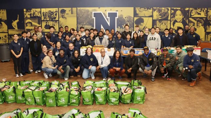 The Newburgh Free Academy high school students teamed up with community members last week to distribute a Thanksgiving giveaway filled with seasonal foods and fresh vegetables.