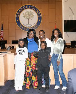 Gabrielle Hill, District 6, has a photo taken after being sworn in as the Orange County Democratic Caucus hosted a historic swearing-in ceremony for its newly elected legislators on Friday, January 2, 2026. Hudson Valley Press/CHUCK STEWART, JR.