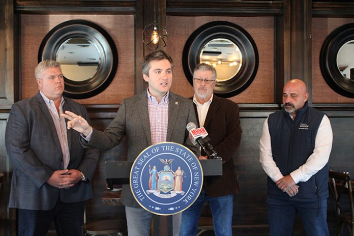 New York State Senator James Skoufis celebrates retail-to-retail being signed into law.