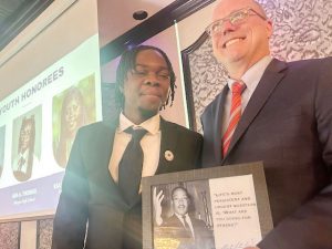 Kimani Henry of Poughkeepsie High School was one of three Youth Honorees recognized at Friday’s MLK, Jr. Breakfast, with William Harris, Director FDR Presidential Library & Museum.