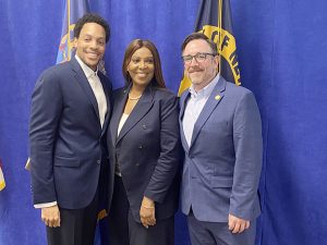 City of Newburgh Manager Todd Venning, New York Attorney General Letitia James and Deputy City Manager Mike Neppl pose for a photo Monday after James announced her office has sued the owners and managers of the Kenney apartment complex in Newburgh, for leaving residents to endure dangerous and decrepit conditions.