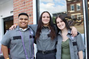 Aiden Corniell (Saugerties Central School District), Aundrea Ortiz (Ellenville Central School District), and Morgan Hicks (Kingston City School District) celebrate their completion of the Law & Public Service program at The Class of 2026 Ulster BOCES Career Pathways Programs Completion Celebration at the Ulster Performing Arts Center in Kingston.