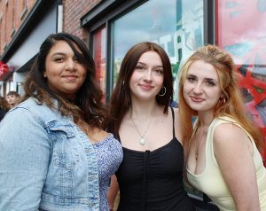 Ulster BOCES graduates Jaralyn Ramos (Wallkill Central School District), Kirra Rogers (Kingston City School District), and Mia Tuttle (Wallkill Central School District) await the start of the Career Pathways Completion Celebration at Ulster Performing Arts Center on May 28, 2026.