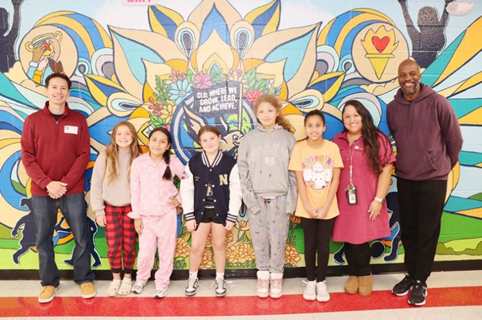 Gardnertown Leadership Academy collaborated with local artist, Joe Pimentel, to create a mural to represent the values of their school.