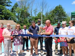 Senator James Skoufis (D-Orange County) joined Supervisor Jesse Dwyer, Mayor Mike Newhard, town employees, and residents for a ribbon cutting to officially re-open the Mountain Lake Park Pool after extensive renovation.