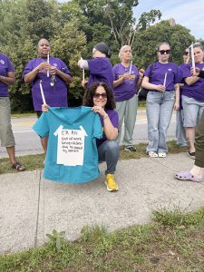 At a vigil, caregivers share stories of broken bones, blackened eyes, lost time due to workplace violence; worker burnout; and chronic understaffing while calling on WMCHealth to raise standards for workers and patients.
