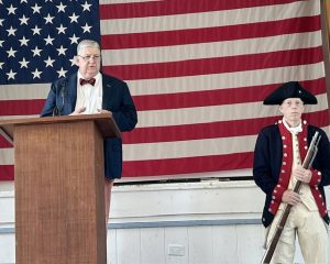 John MacEnroe, Retired Army Officer Veterans Memorial Building and Co-Chair, Beacon REV250 Committee, provides the Welcome Remarks Saturday.