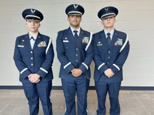 Three of the four Newburgh Free Academy AF- JROTC Color Guard members involved in the Presentation of Colors & Flag Raising take a break from touring the new Career & Technical Education Center at Monday’s ribbon cutting ceremony.