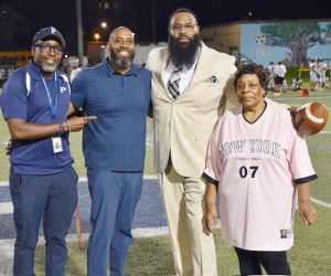 Friday night at the Poughkeepsie High School Football season and home opener game against Hyde Park the most accomplished Pioneer alumni football player- Charles “Big Juney” Spencer Jr.- of the past half century had his number 77 jersey retired. The former defensive end in high school, Spencer earned a full scholarship to the University of Pittsburgh, where he transitioned to an offense guard, enjoying an incredible collegiate career, leading to his being drafted as the 65th overall pick by the NFL’s Houston Texans.
