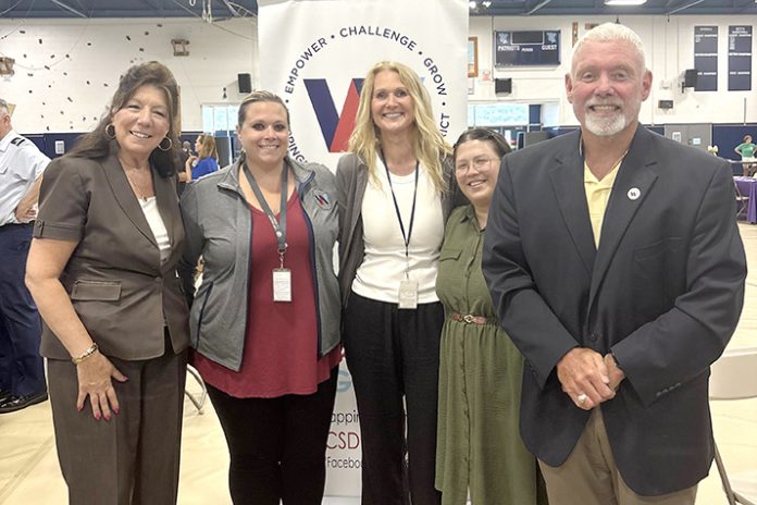 Dutchess County Executive Sue Serino (left) and Wappingers Central School District Superintendent Dr. Dwight Bonk (right) joined school district staff who were among the dozens of vendors at the “Putting Your Skills Back to Work” Older Adults Skills Fair at John Jay High School.