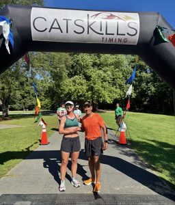 Winners Katey Banuth and Juan Luna pose for a photo at the 3rd Annual Orange Peel to Pavement Fun Run/Walk 5K.